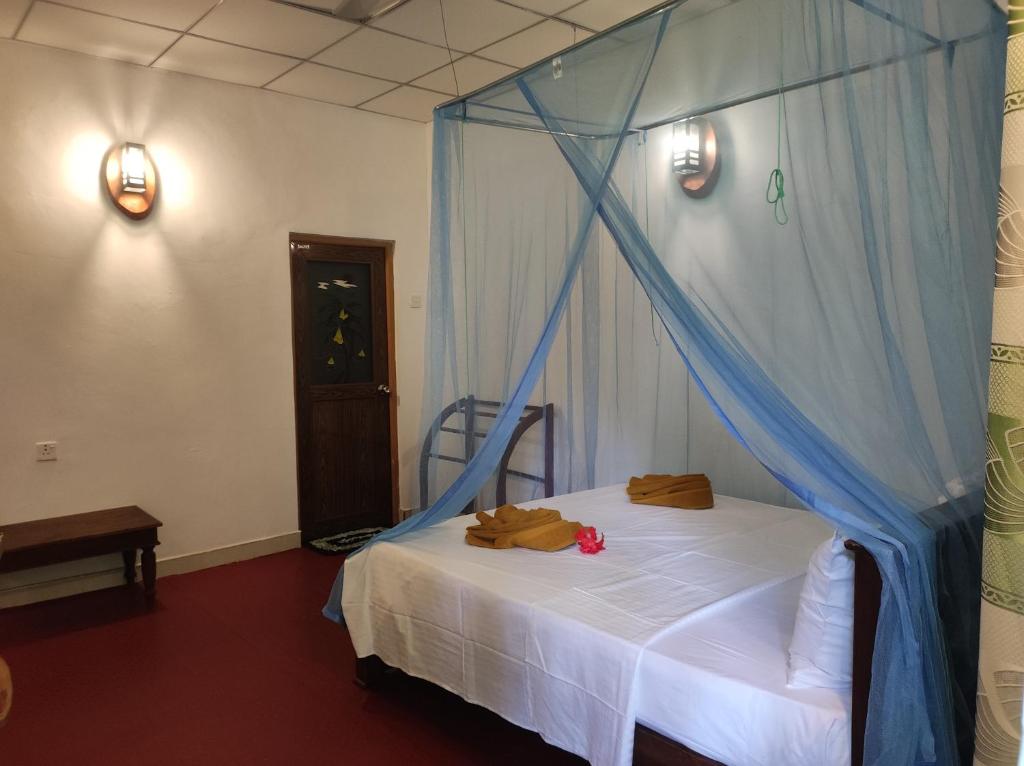 Postel nebo postele na pokoji v ubytování Jaana Guest