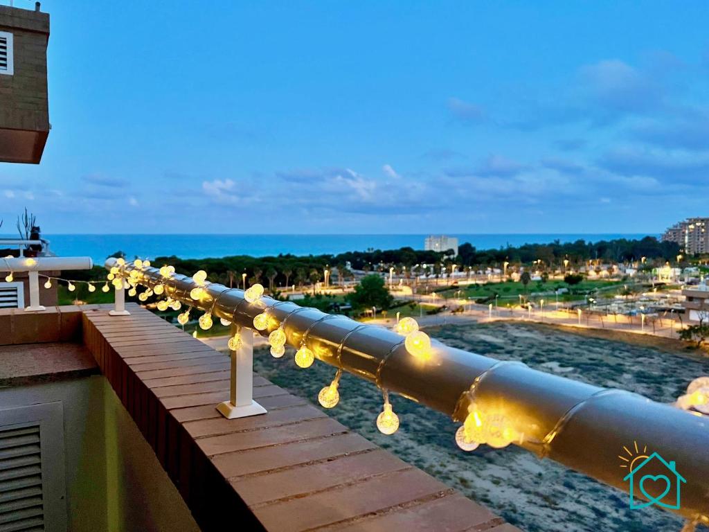 a long line of lights on a balcony at Retiro Zen en Tu Rincón Mediterráneo in Oropesa del Mar
