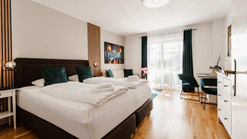 Postel nebo postele na pokoji v ubytování Seeblick Apartment