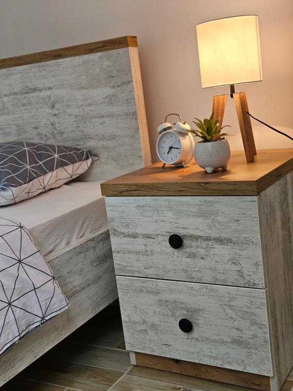 Postel nebo postele na pokoji v ubytování Apartman Sky