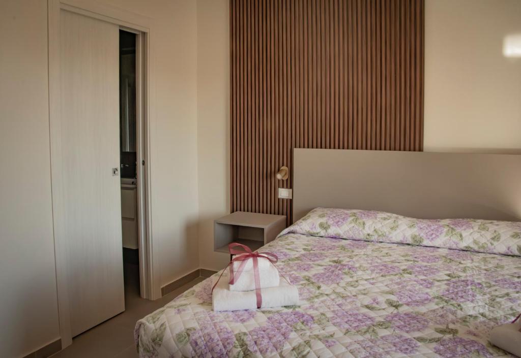 Postel nebo postele na pokoji v ubytování B&B Il Giardino Dei Templi