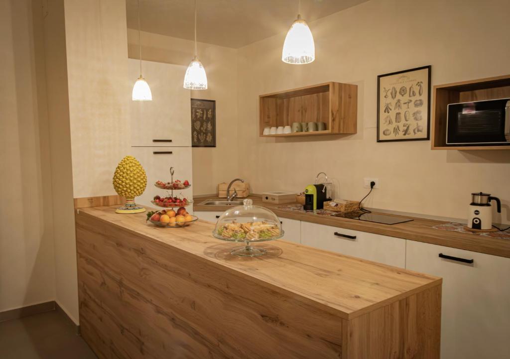 Kuchyň nebo kuchyňský kout v ubytování B&B Il Giardino Dei Templi