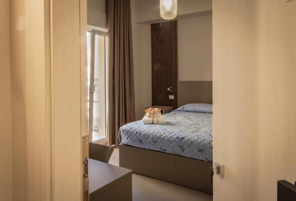 Postel nebo postele na pokoji v ubytování B&B Il Giardino Dei Templi
