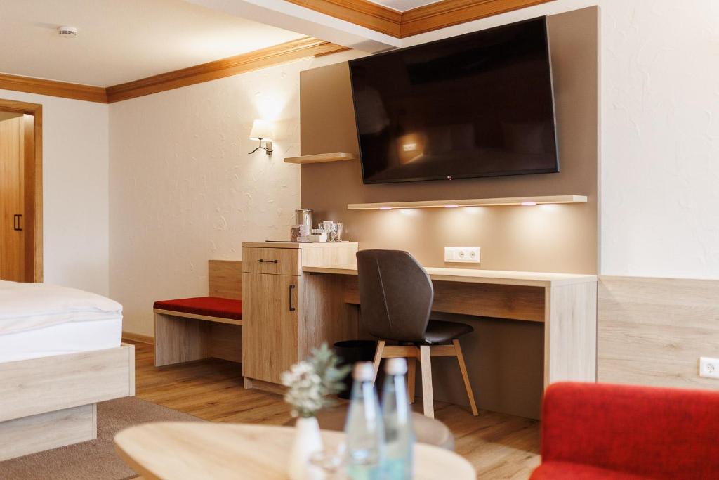 TV a/nebo společenská místnost v ubytování Boutiquehotel Ochsen