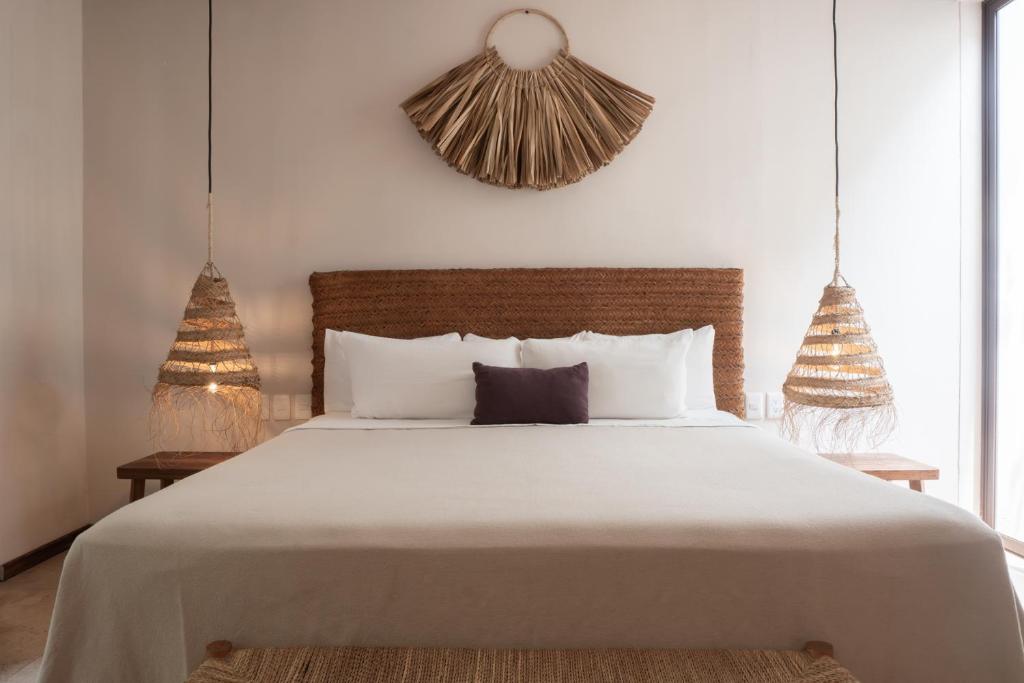 Postel nebo postele na pokoji v ubytování Hotel Casa Hormiga