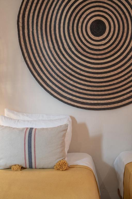Postel nebo postele na pokoji v ubytování Hotel Casa Hormiga