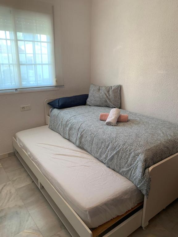 Postel nebo postele na pokoji v ubytování Apartamento Carihuela a 300 metros playa