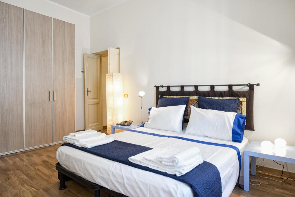 En eller flere senge i et værelse på Casa Elena - ItalyHolidayHouse