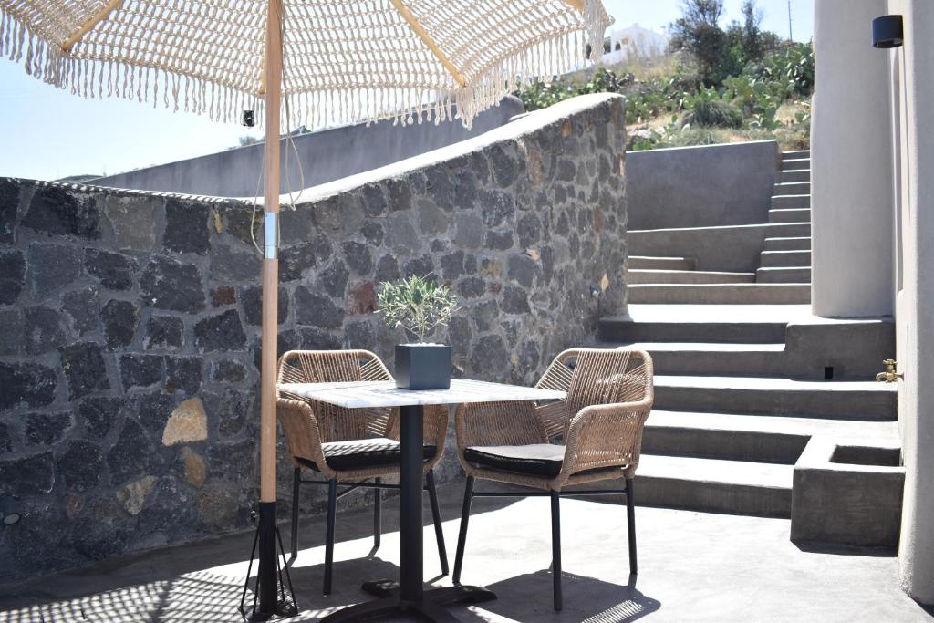 Posezení v ubytování Panthea Suite Santorini - Private pool