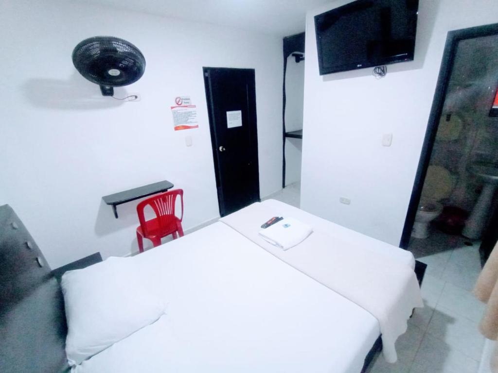 TV a/nebo společenská místnost v ubytování Hotel Jahdai Curumani