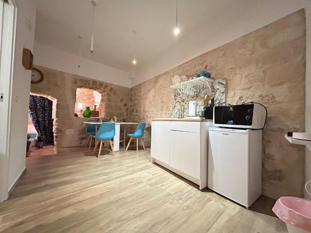Kuchyň nebo kuchyňský kout v ubytování A Casa Di Rita