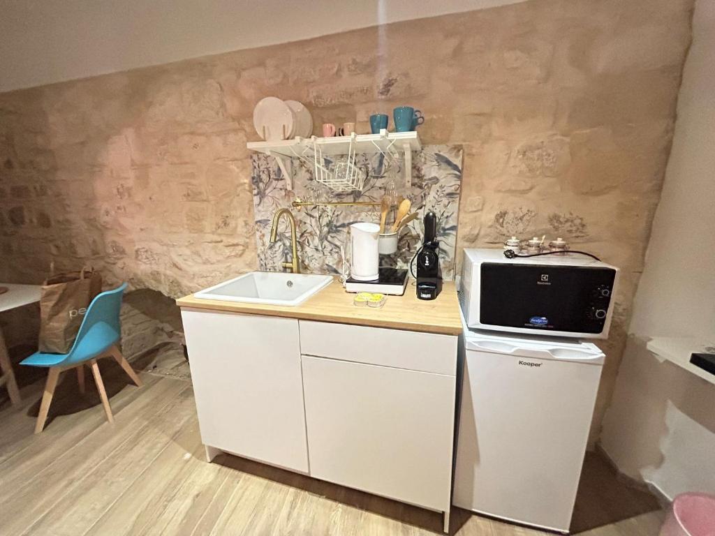 Kuchyň nebo kuchyňský kout v ubytování A Casa Di Rita