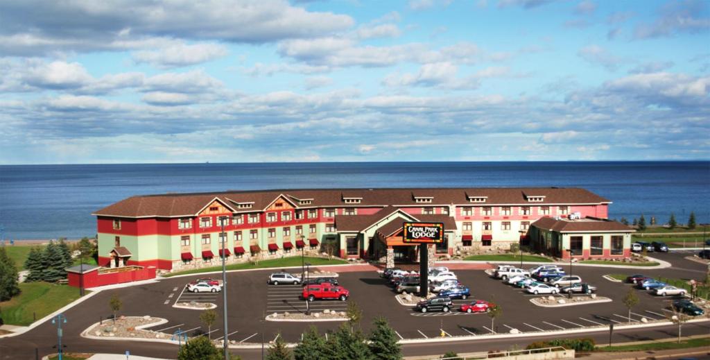 a rendering of a hotel with a parking lot at Canal Park Lodge in Duluth