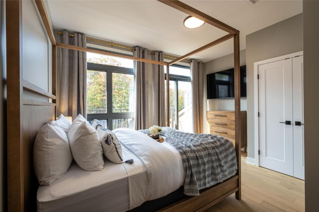 Postel nebo postele na pokoji v ubytování Tremblant Prestige - Verbier 8-202