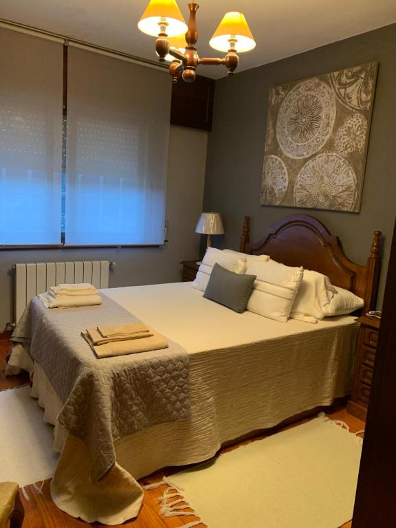 Postel nebo postele na pokoji v ubytování Casa Nanda