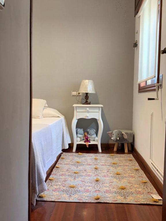 Postel nebo postele na pokoji v ubytování Casa Nanda