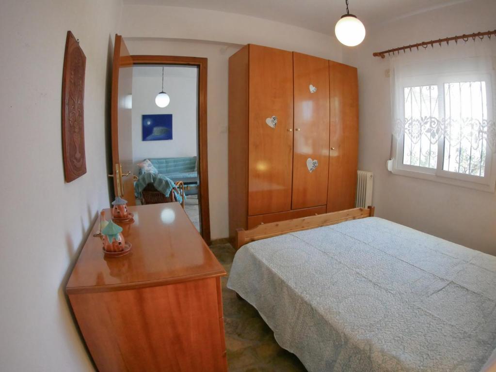 Postel nebo postele na pokoji v ubytování Paradiso Apartments with sea view