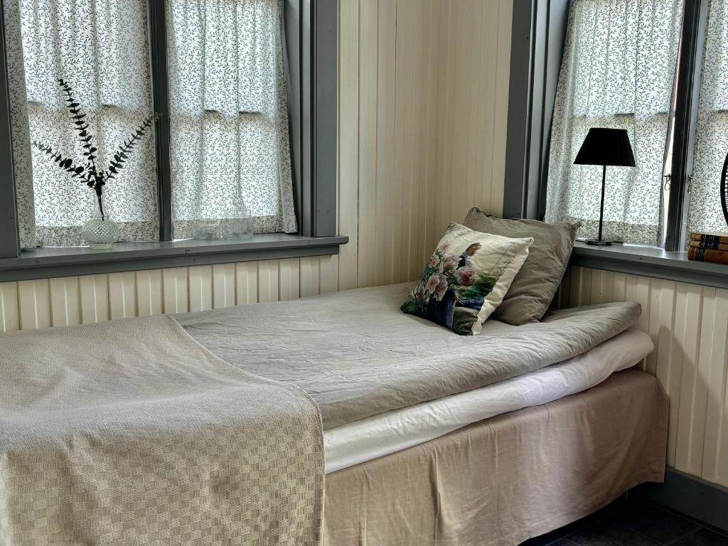 Postel nebo postele na pokoji v ubytování Lydde Gård