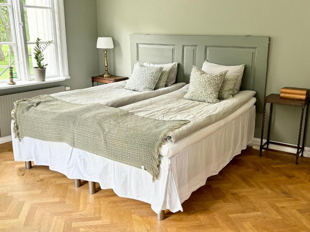 Postel nebo postele na pokoji v ubytování Lydde Gård