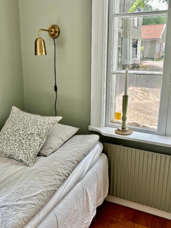 Postel nebo postele na pokoji v ubytování Lydde Gård