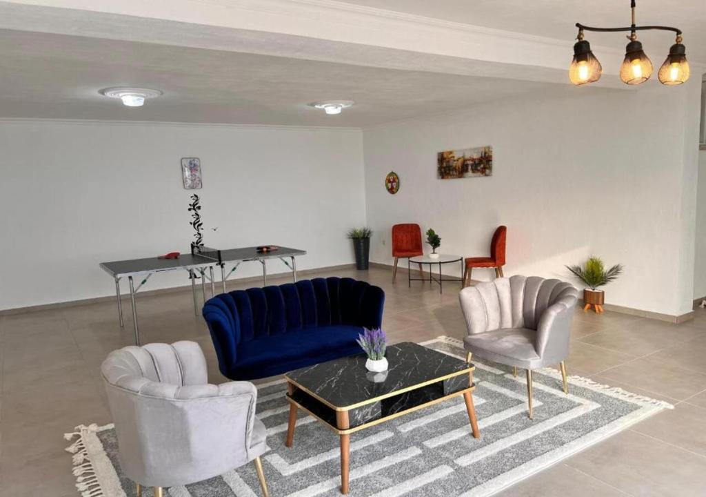 A seating area at Bodrum eaSon Villa & House 350m2 Full Sea View with Private Infinity Pool