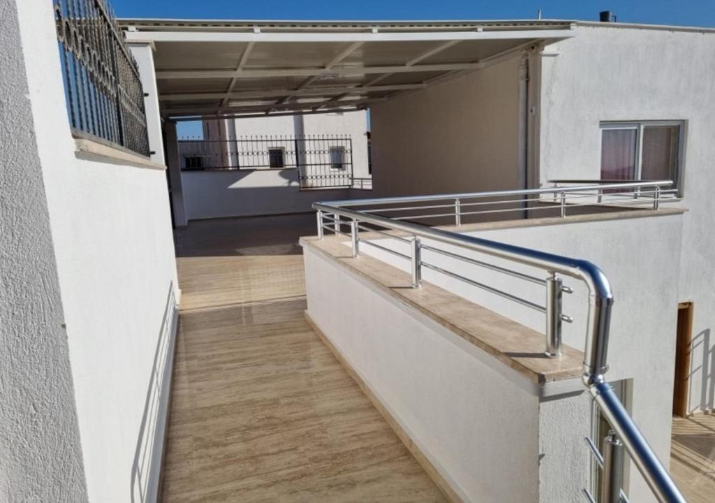 A balcony or terrace at Bodrum eaSon Villa & House 350m2 Full Sea View with Private Infinity Pool