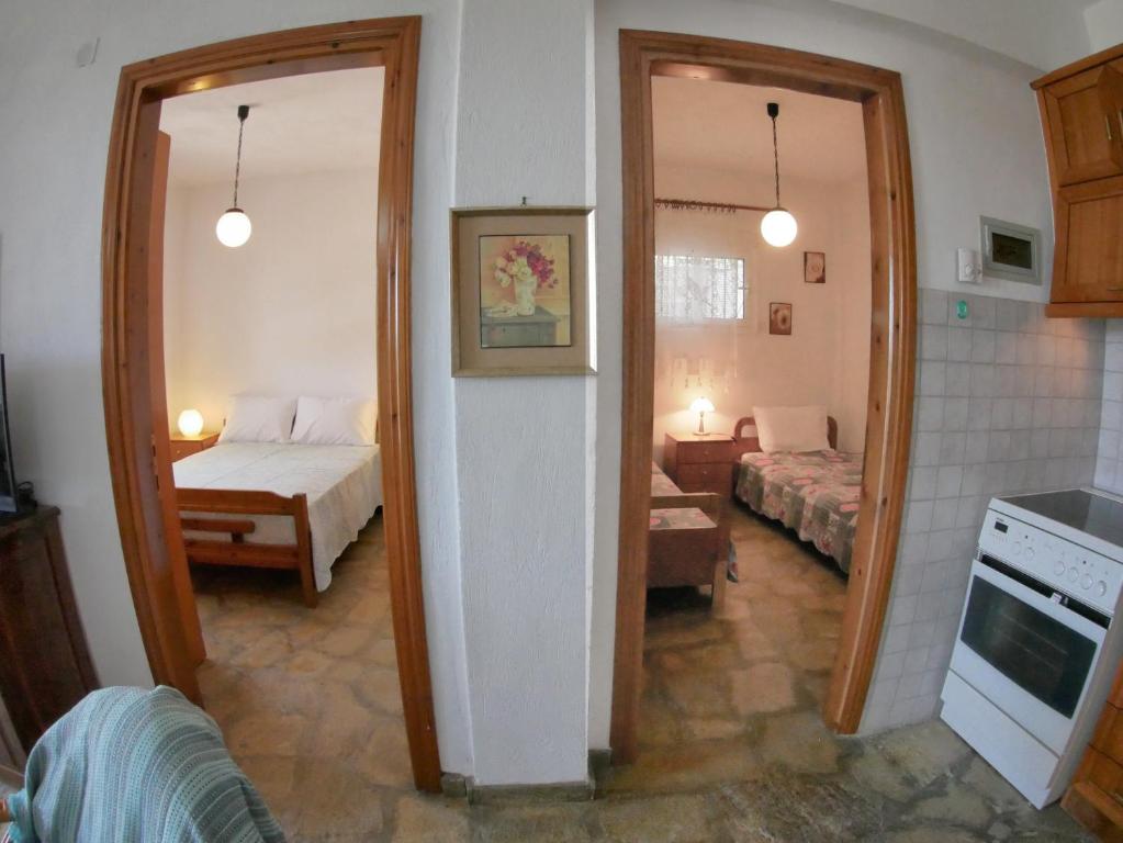 Postel nebo postele na pokoji v ubytování Paradiso Apartments with sea view