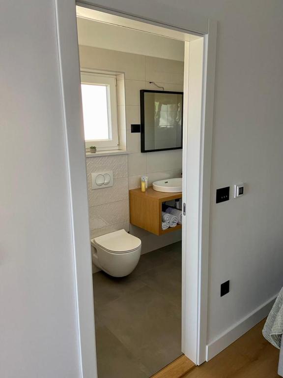 Koupelna v ubytování Portum rooms