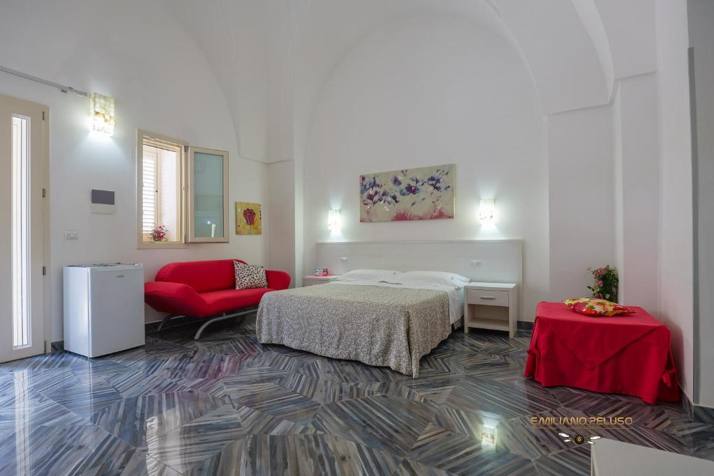 A bed or beds in a room at Casa Alfieri"rooms and Apartments"