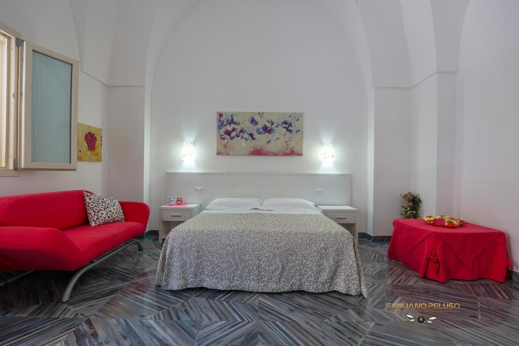 A bed or beds in a room at Casa Alfieri"rooms and Apartments"
