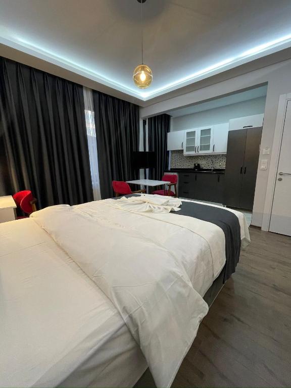Postel nebo postele na pokoji v ubytování Fabesco Suite