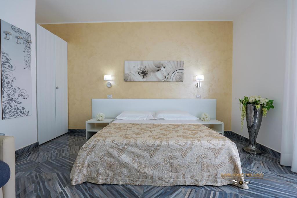 A bed or beds in a room at Casa Alfieri"rooms and Apartments"