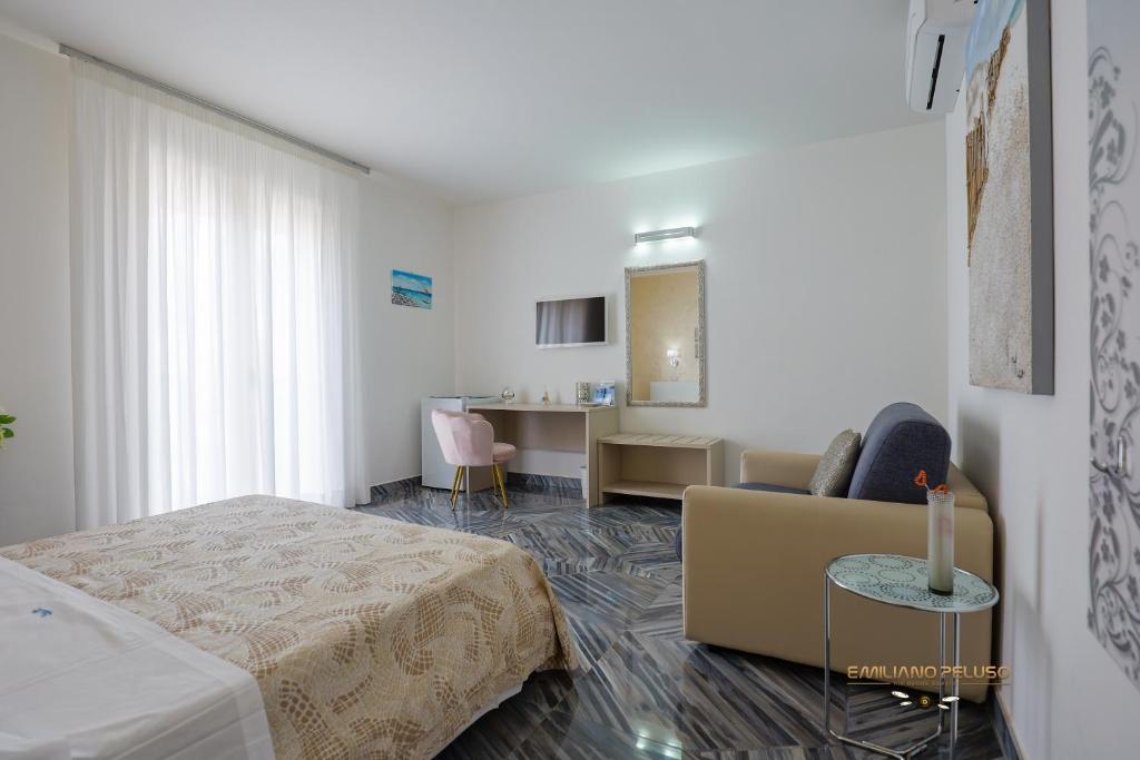 A bed or beds in a room at Casa Alfieri"rooms and Apartments"