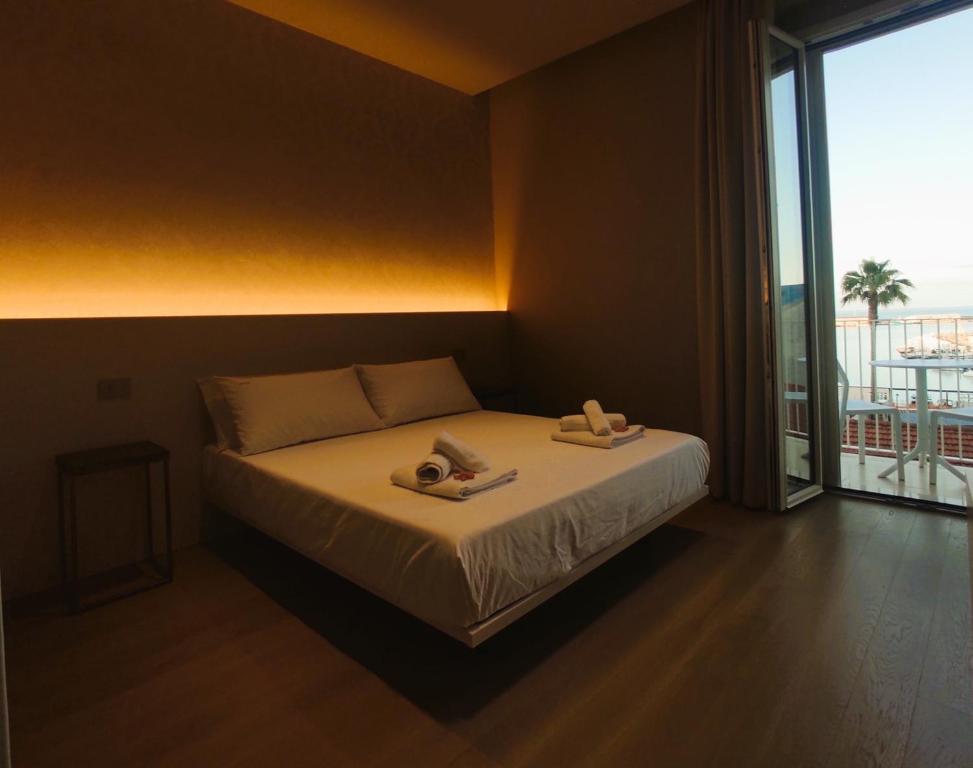 SAVANTO - Chambre Lit Queen-Size Avec Vue Sur Mer