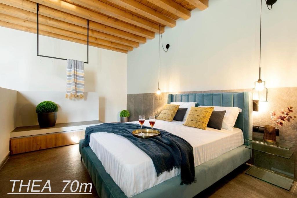Postel nebo postele na pokoji v ubytování Lindos Serenity Suites