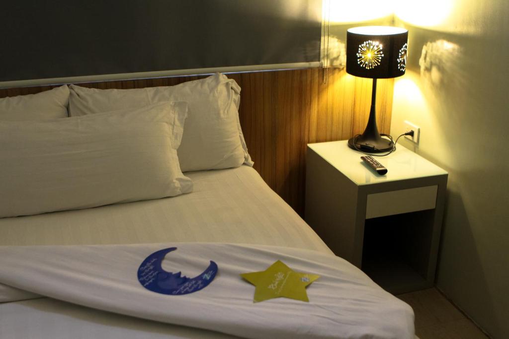 Letto o letti in una camera di Z Pad Residences
