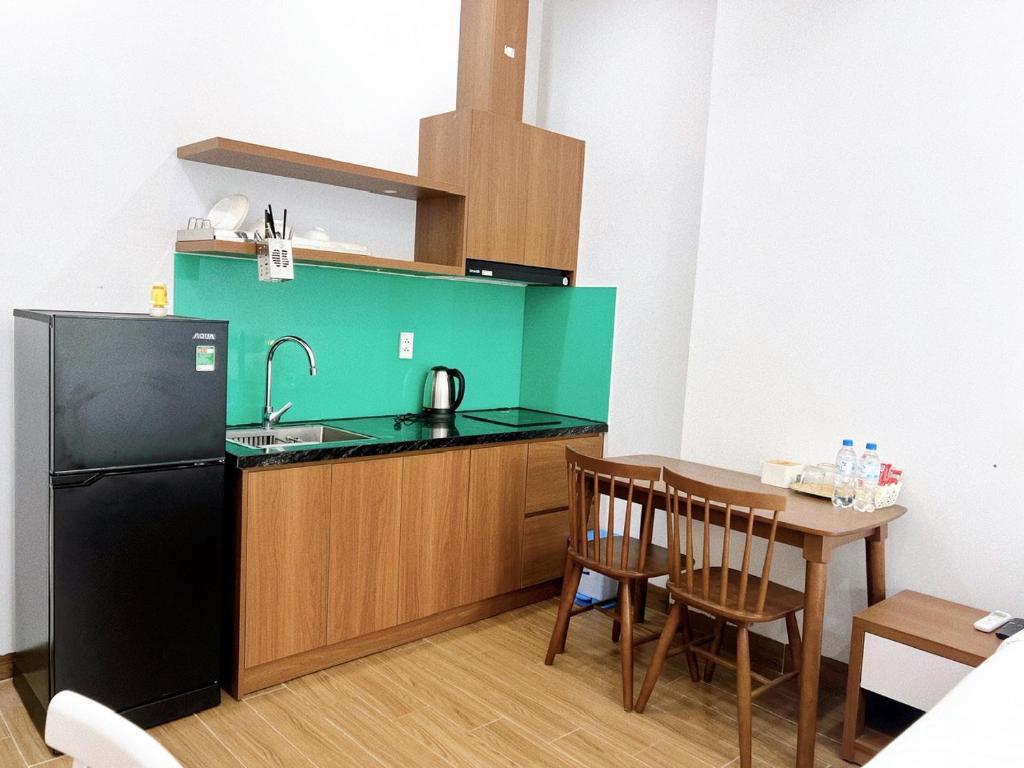 Nhà bếp/bếp nhỏ tại Samatha Apartment & Hotel