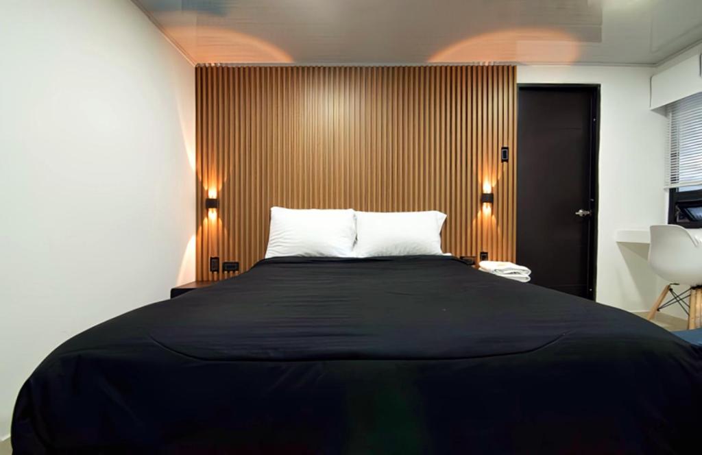 Postel nebo postele na pokoji v ubytování Hotel Cordi