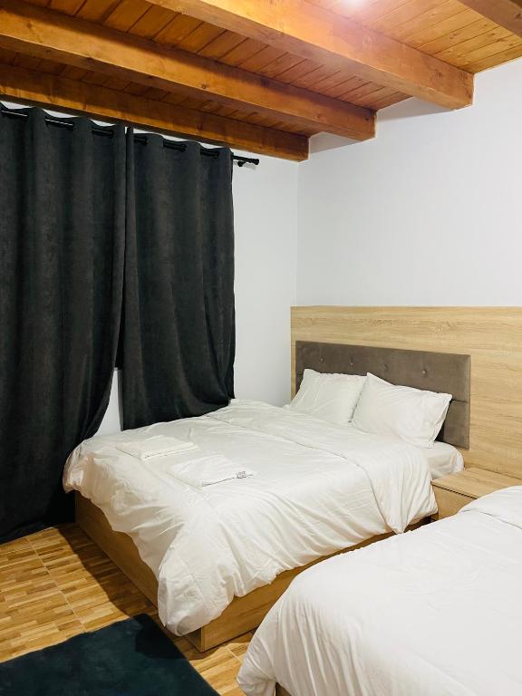 Postel nebo postele na pokoji v ubytování Thethi view