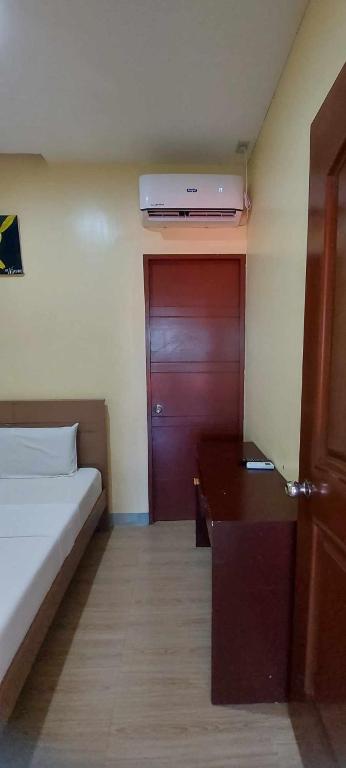 Postel nebo postele na pokoji v ubytování B&S Orchids suites hotel