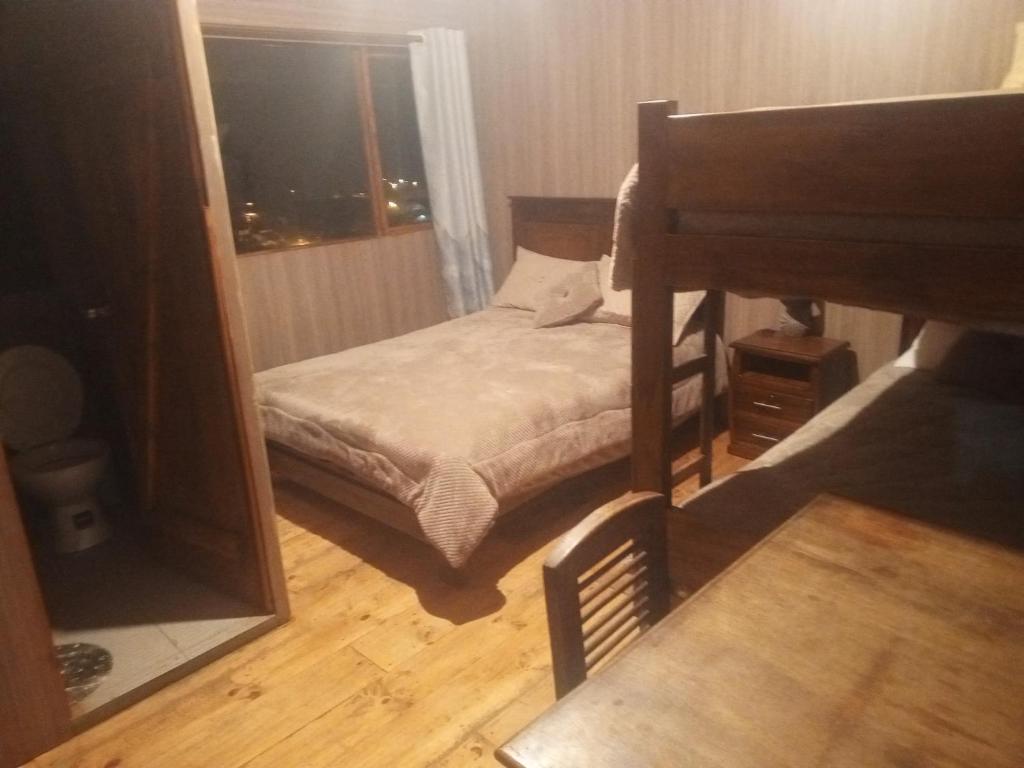 Postel nebo postele na pokoji v ubytování EL TRAPICHE