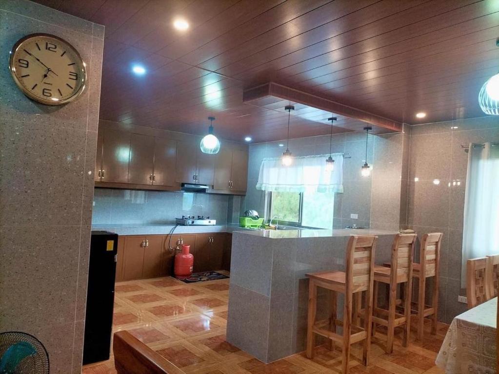 Η κουζίνα ή μικρή κουζίνα στο Ardenia transient house