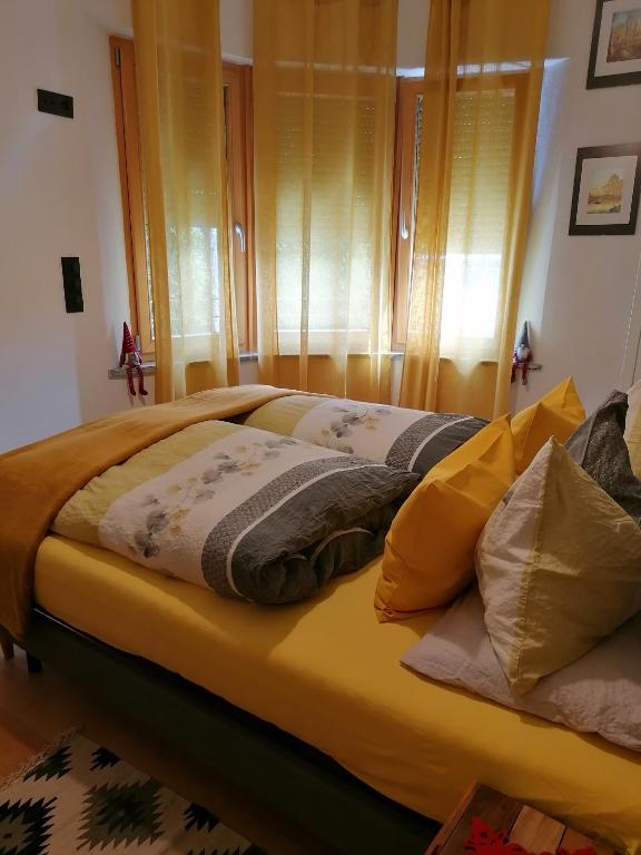 Postel nebo postele na pokoji v ubytování Villa Alessandra