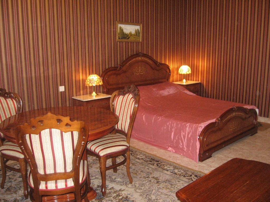 Postel nebo postele na pokoji v ubytování Giuseppe Hotel