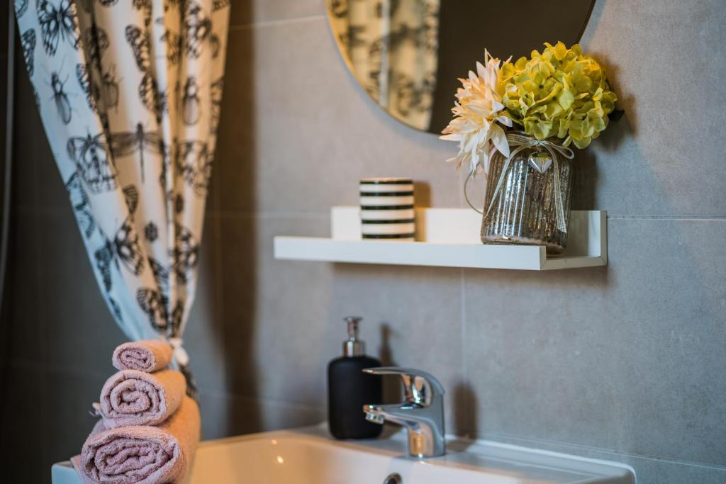Kúpeľňa v ubytovaní Pitypang Apartman Siófok