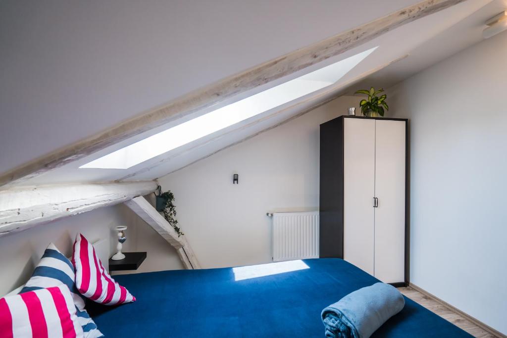 Posteľ alebo postele v izbe v ubytovaní Pitypang Apartman Siófok