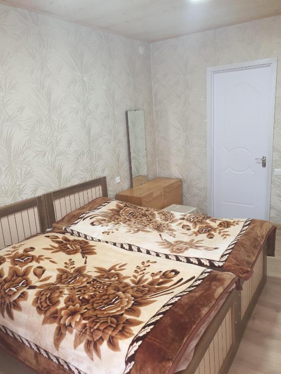 Postel nebo postele na pokoji v ubytování Guest House Vivaushba