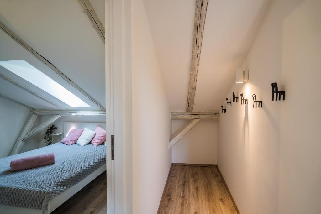 Posteľ alebo postele v izbe v ubytovaní Pitypang Apartman Siófok