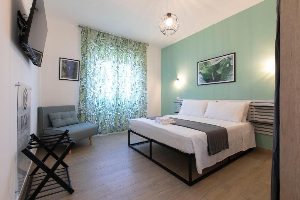 DOMINA Guest House - Chambre Deluxe (2 Adultes + 1 Enfant)