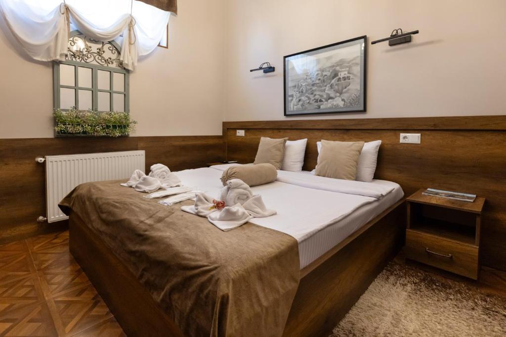 Llit o llits en una habitació de Hestia Boutique Hotel